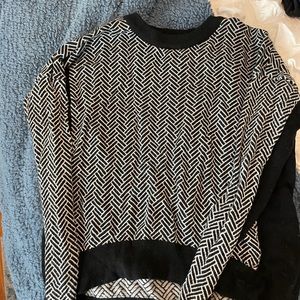 Black patterned Lululemon sweater. Size medium